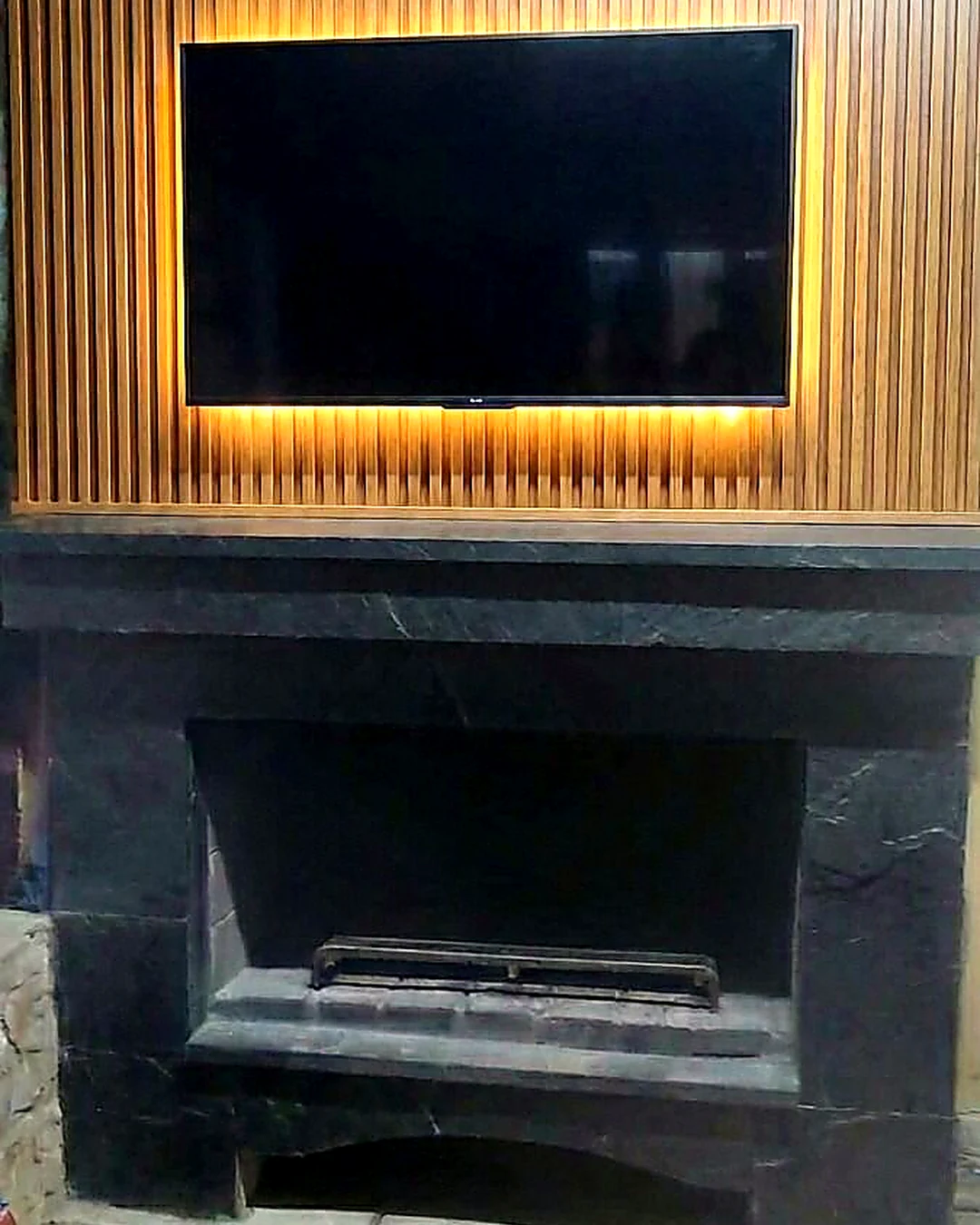 TV wall with vertical cladding